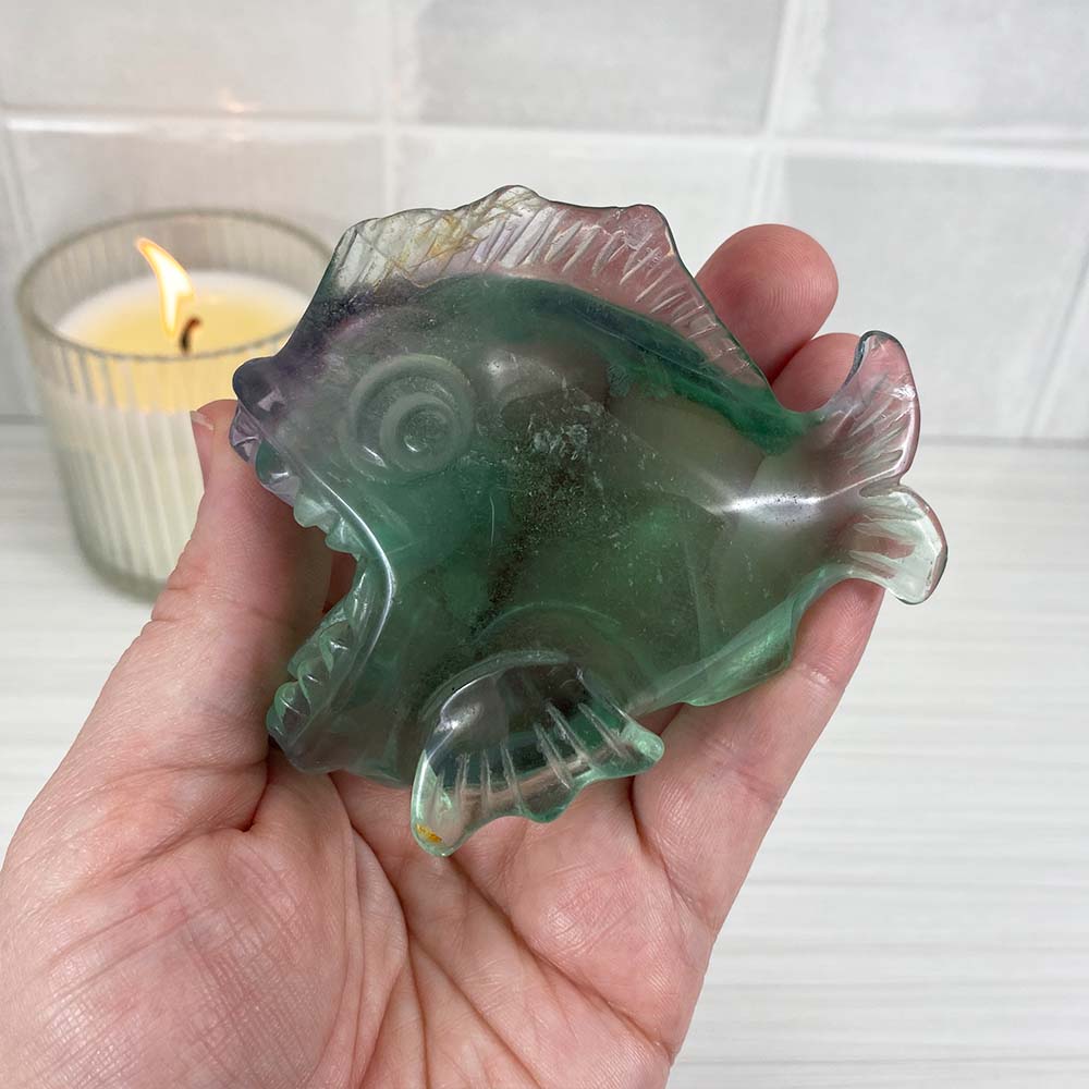 Polished Green and Purple Fluorite Piranha Carving