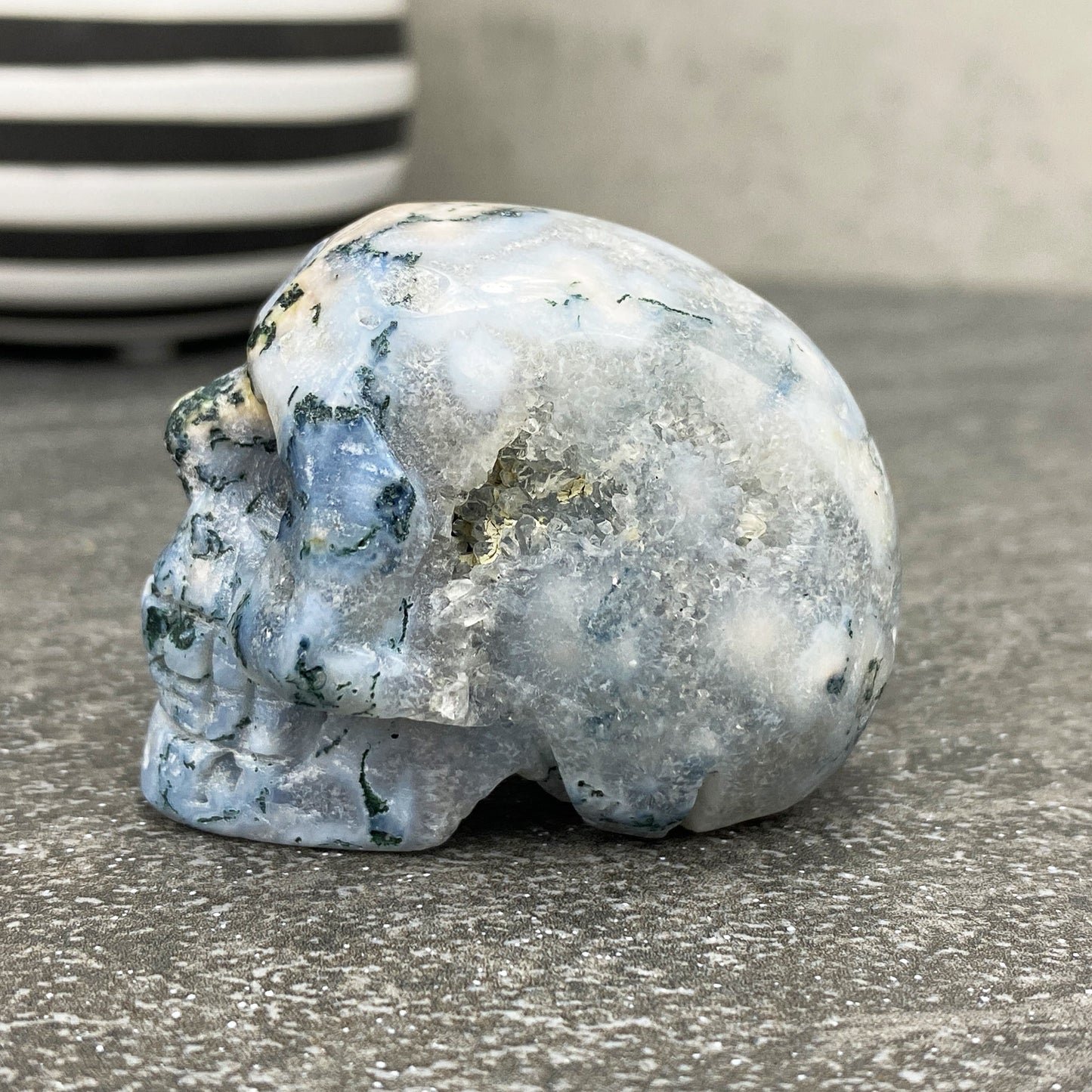 Polished Moss Agate Crystal Skull Carving
