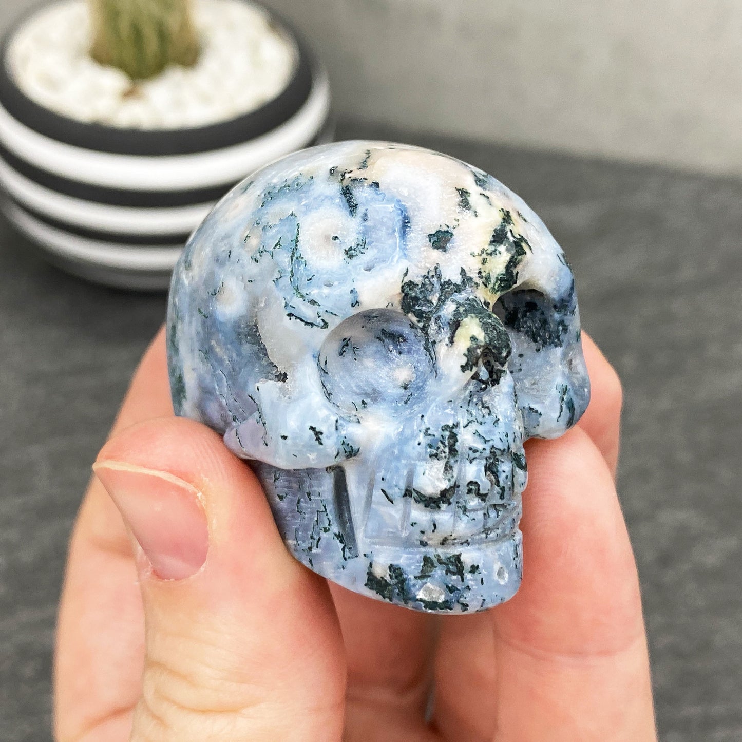 Polished Moss Agate Crystal Skull Carving