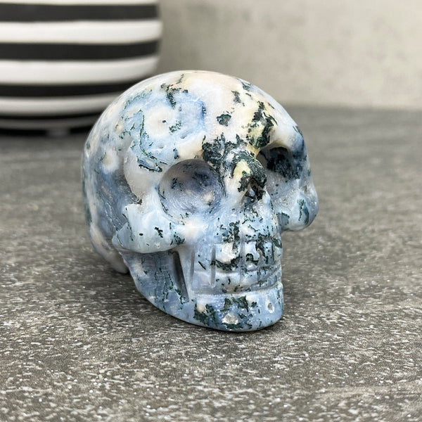 Polished Moss Agate Crystal Skull Carving