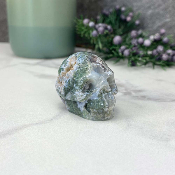 Polished Moss Agate Skull Carving