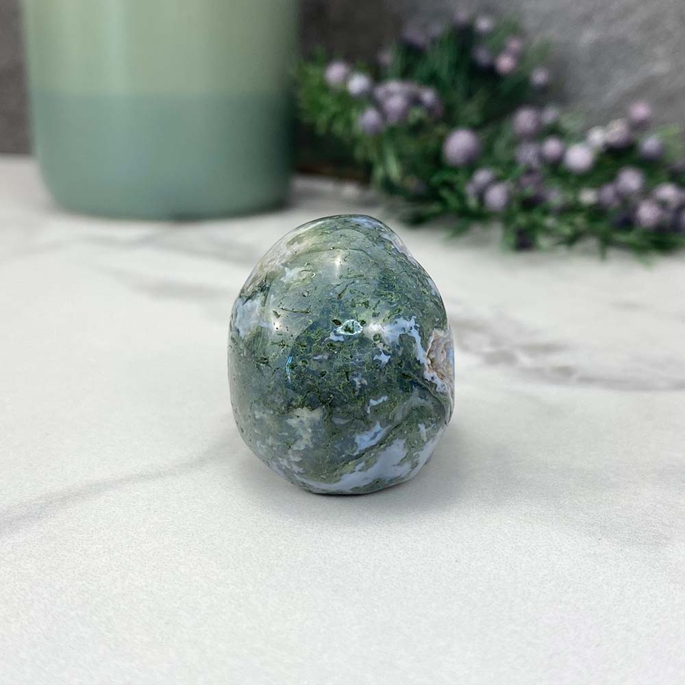 Polished Moss Agate Skull Carving