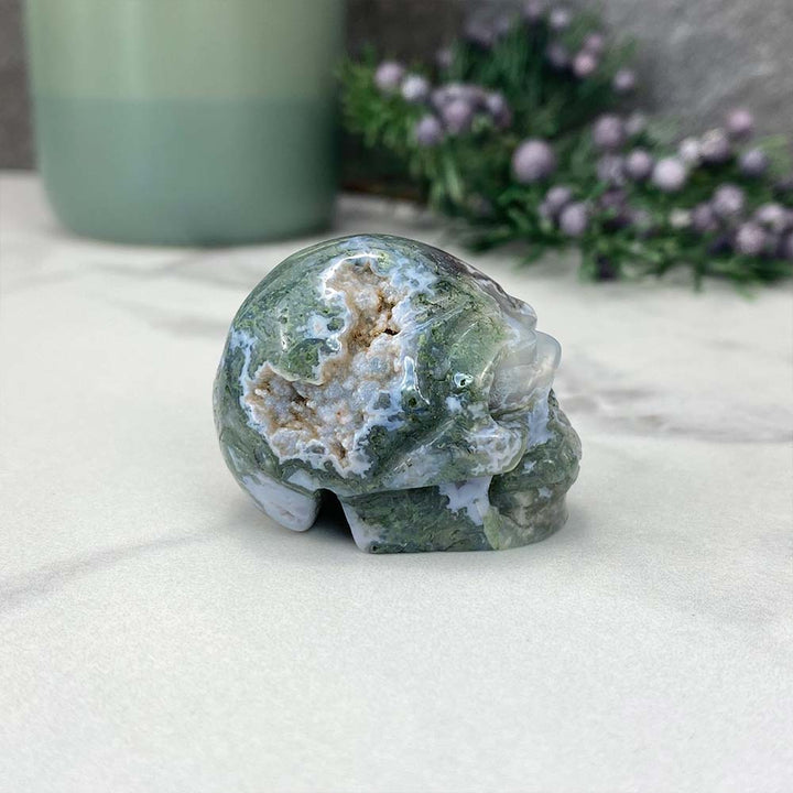 Polished Moss Agate Skull Carving