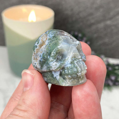 Polished Moss Agate Skull Carving