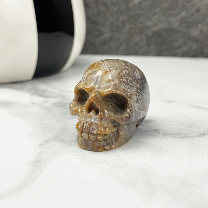 Polished Moss Agate Stone Skull Carving