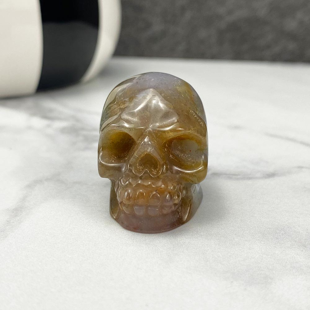 Polished Moss Agate Skull Carving