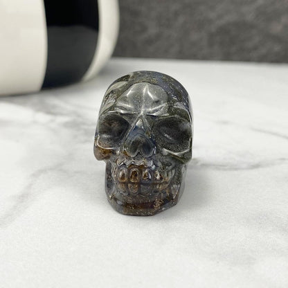 Polished Moss Agate Stone Skull Carving