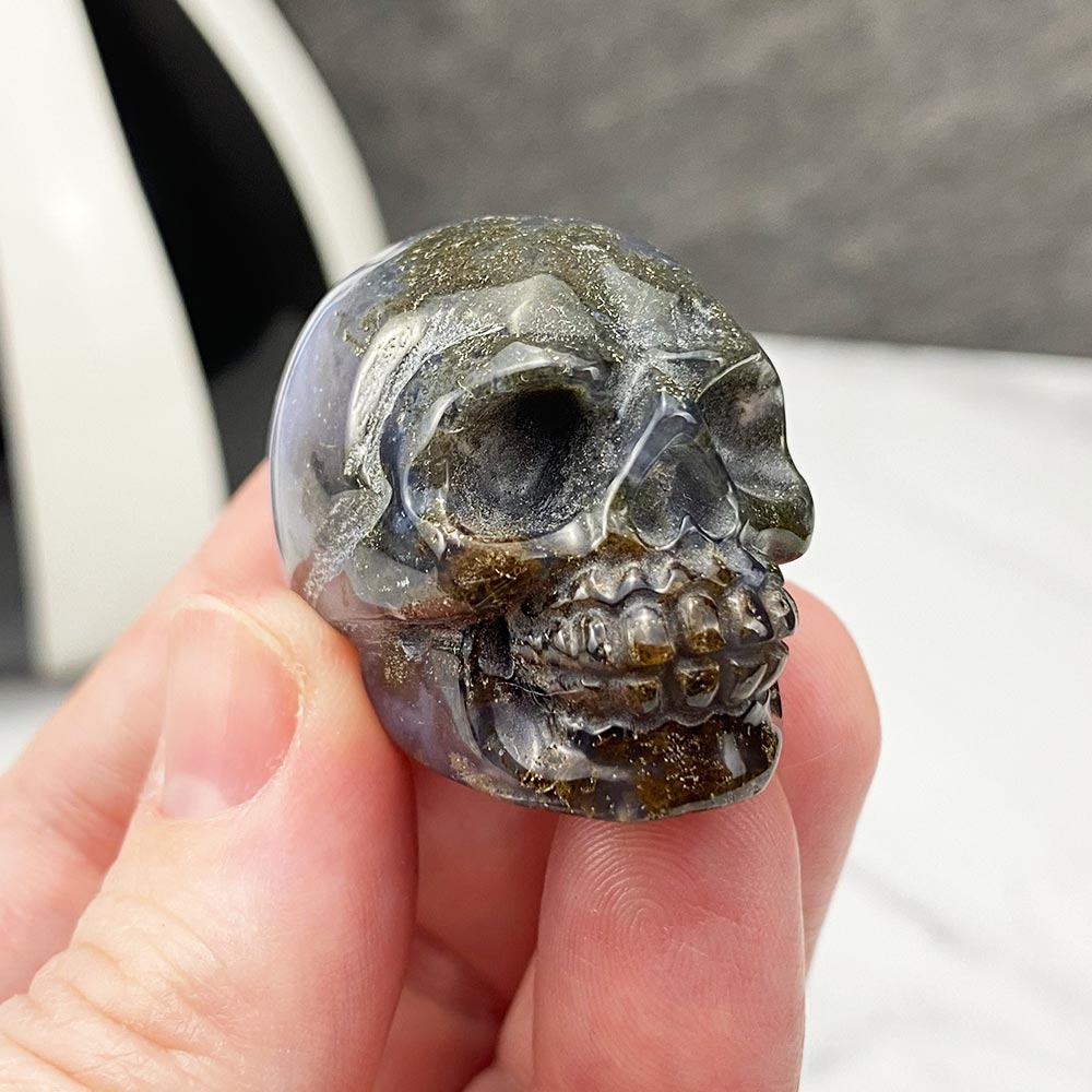Polished Moss Agate Stone Skull Carving