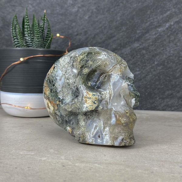 Polished Moss Agate Skull Carving