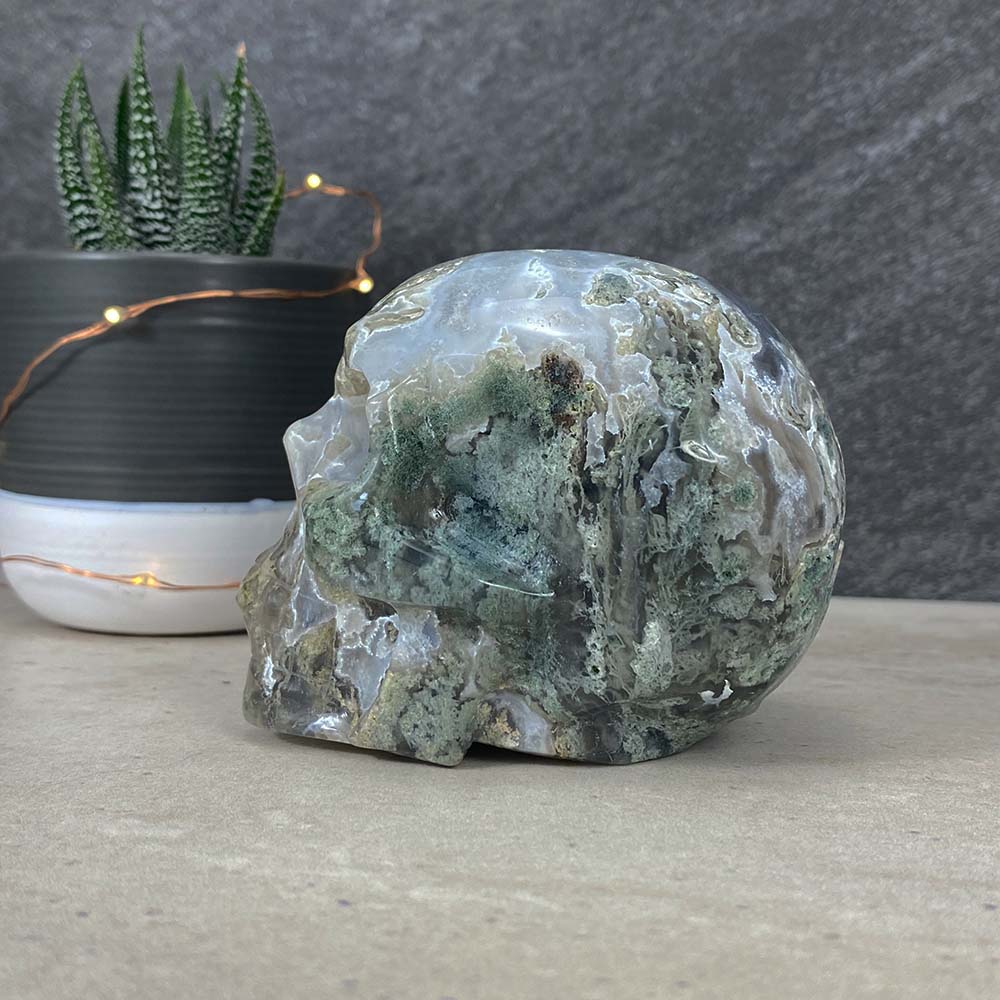Polished Moss Agate Skull Carving