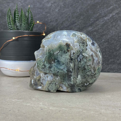 Polished Moss Agate Skull Carving