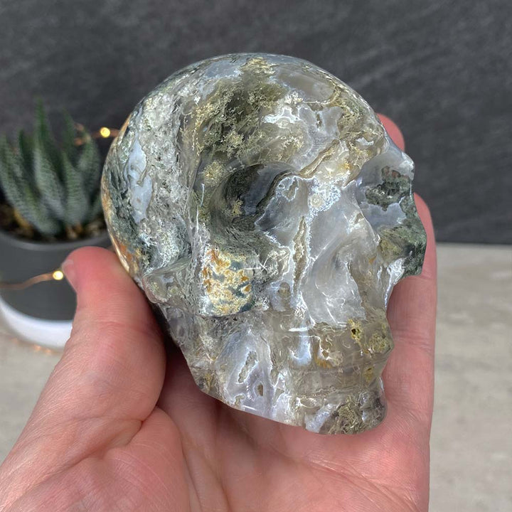 Polished Moss Agate Skull Carving