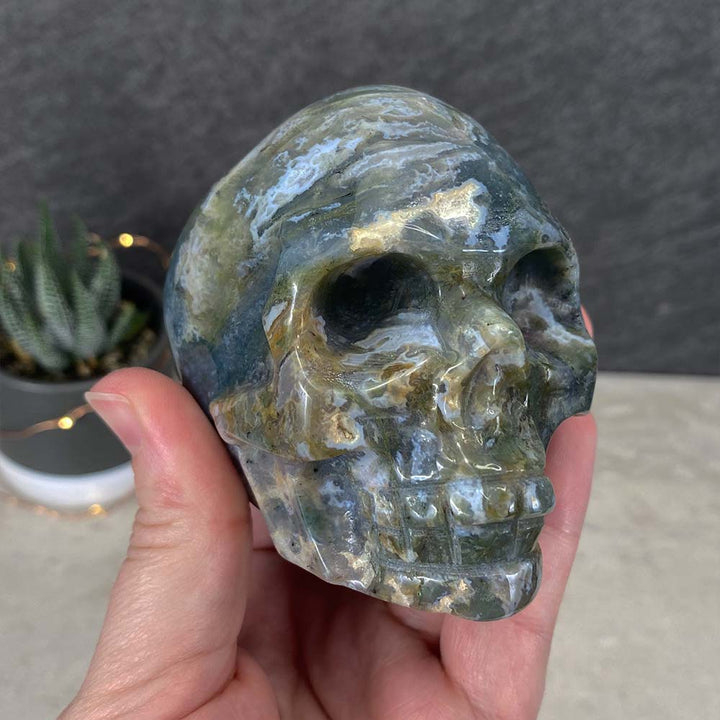 Polished Moss Agate Skull Carving