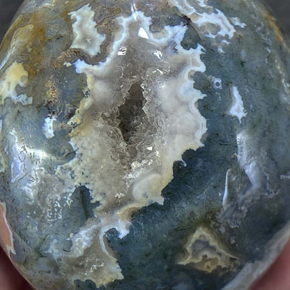 Polished Moss Agate Skull Carving