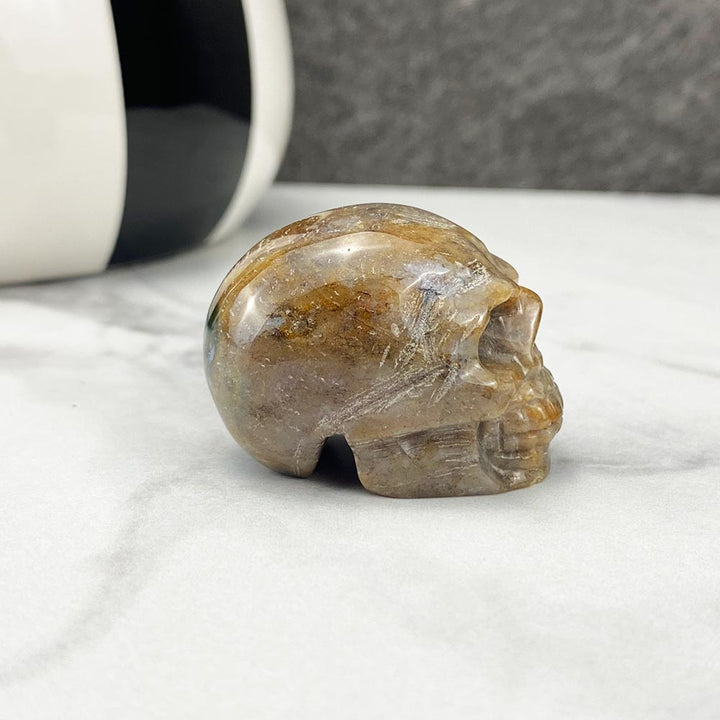 Polished Moss Agate Stone Skull Carving