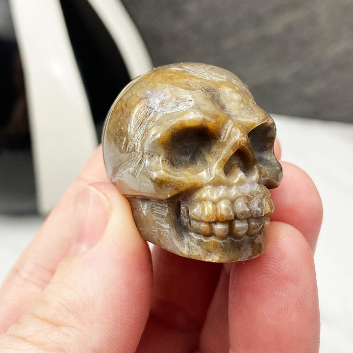 Polished Moss Agate Stone Skull Carving