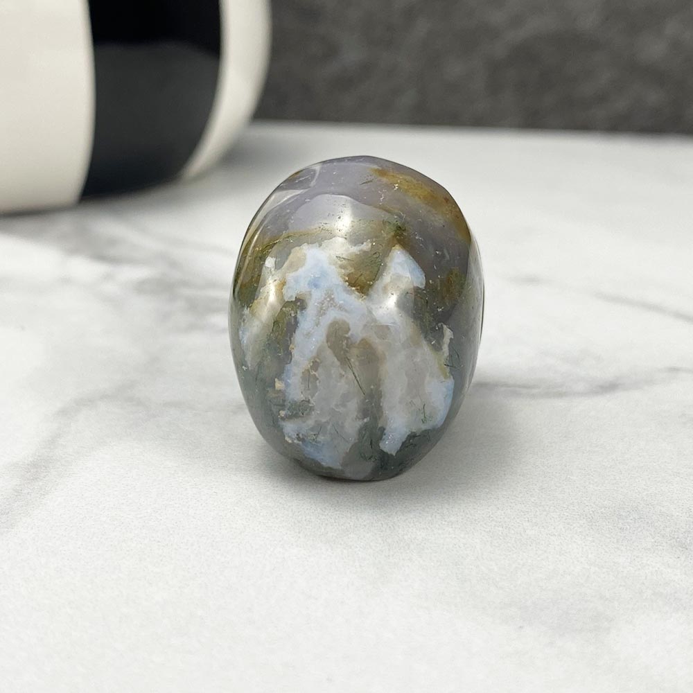Polished Moss Agate Skull Carving
