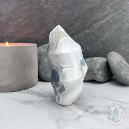 Polished Orca Agate With Crackle Quartz Flame