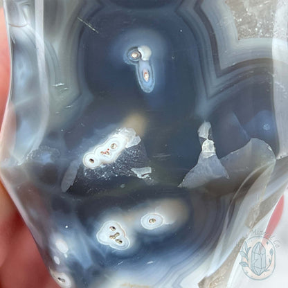 Polished Orca Agate With Crackle Quartz Flame