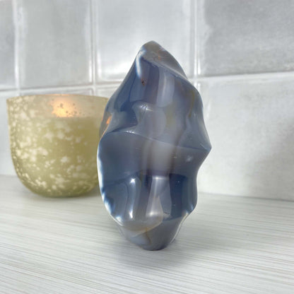 Polished Orca Agate Flame