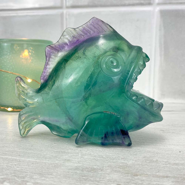 Polished Rainbow Fluorite Crystal Piranha Carving